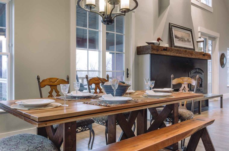 industrial farmhouse style dining room table custom built and designed by Silent Rivers for industrial farmhouse style new home in St. Charles, Iowa