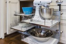 Magic corner cabinet for blind corner cabinet in West Des Moines Clive kitchen remodeler Silent Rivers allows Kitchen Aid mixer to come to you easily out of the corner cabinet