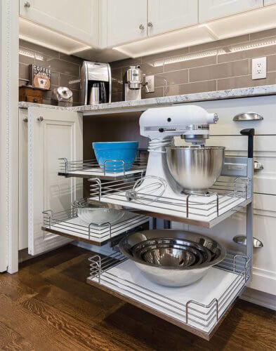 magic corner cabinet in Clive, Iowa kitchen remodel by Silent Rivers of Des Moines features layered storage