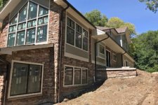 Custom Home Update: A Home Exterior Wraps Up + Interior Progress