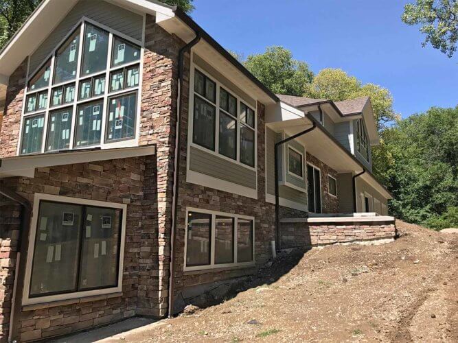 Custom Home Update: A Home Exterior Wraps Up + Interior Progress