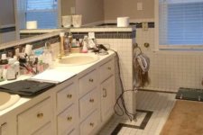 1980s bathroom in need of remodel by Silent Rivers of Des Moines