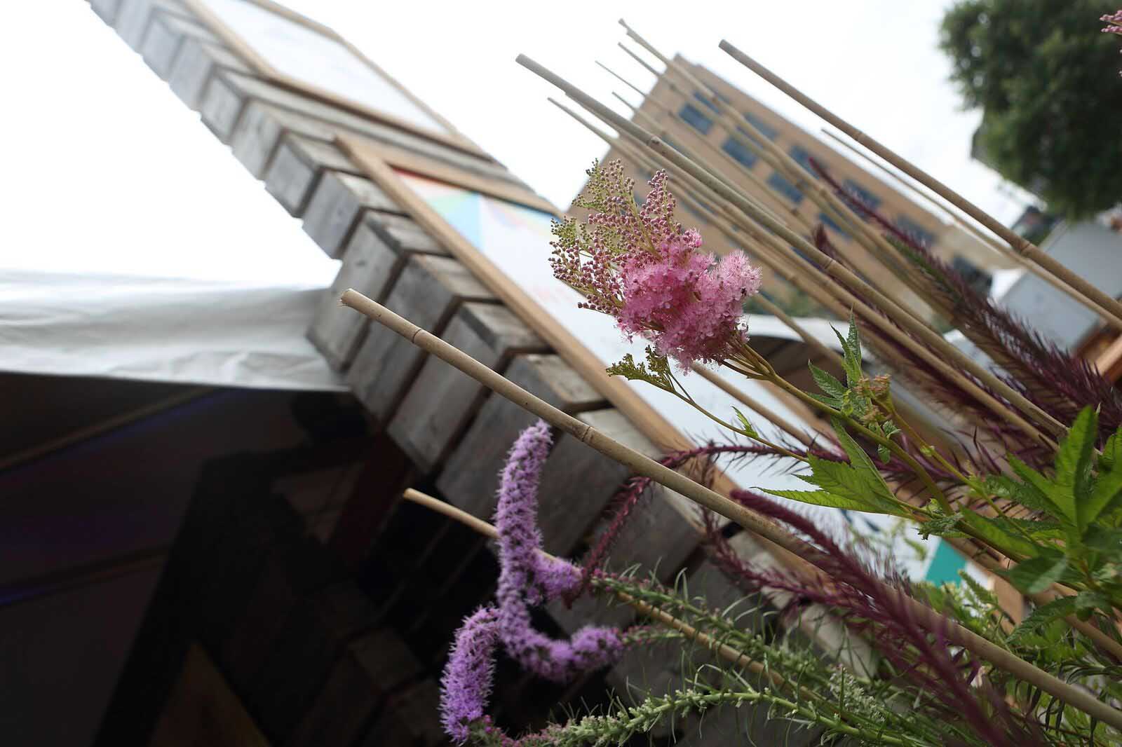 Silent Rivers VIP Club at 2018 Des Moines Arts Festival with sustainable materials and garden