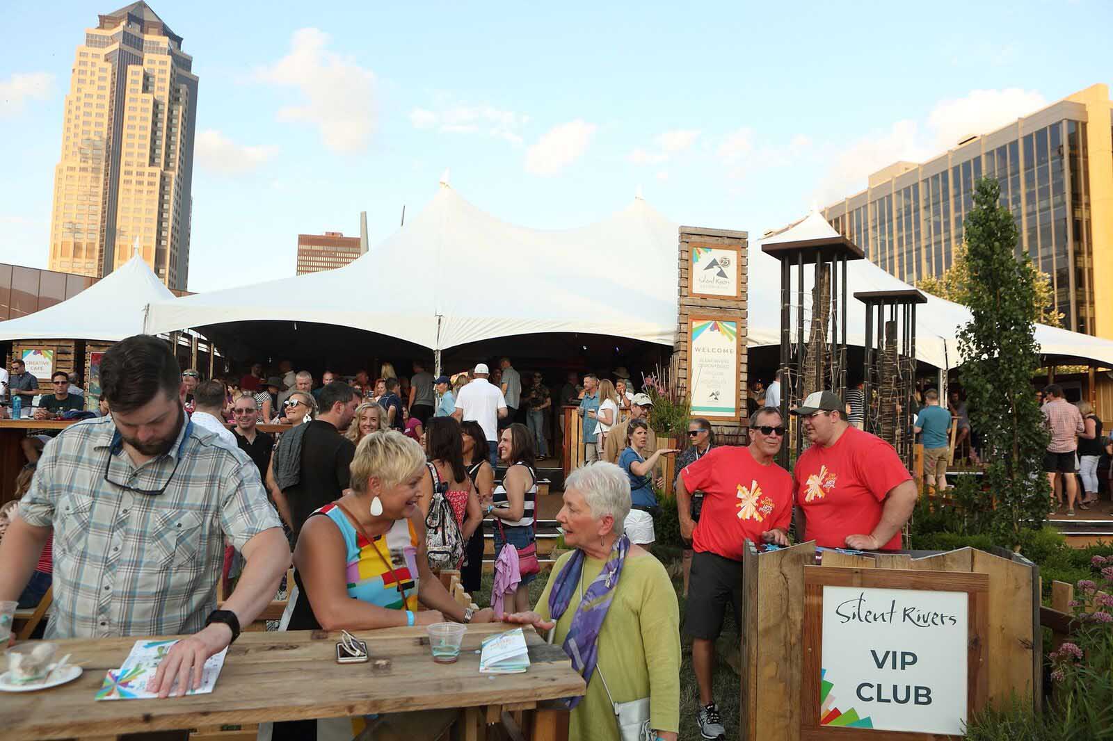 People enjoying Silent Rivers VIP Club at 2018 Des Moines Arts Festival