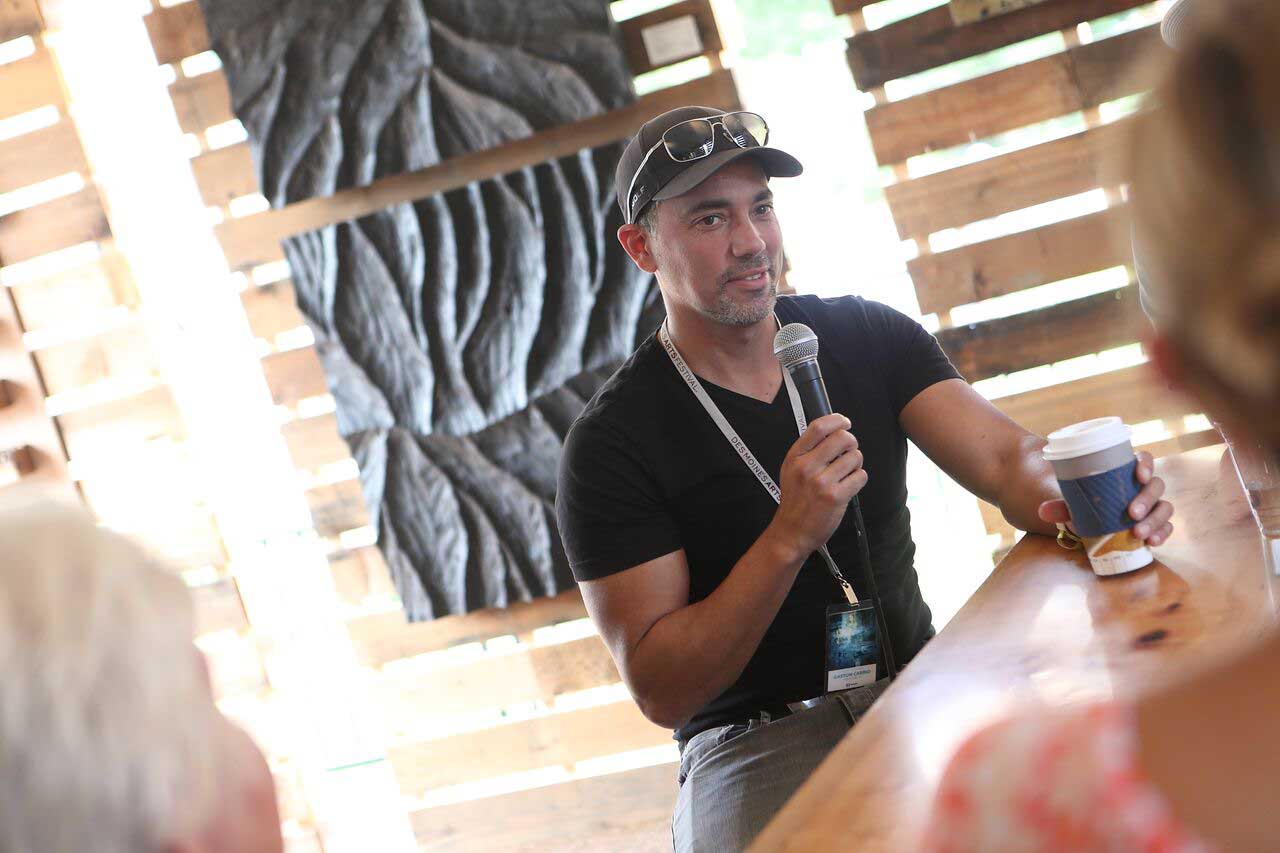 Gaston Carrio artist and architect from Houston, DMAF Curated exhibit and presentations in the Creative Cafe area of the Silent Rivers VIP Club at the 2018 Des Moines Arts Festival