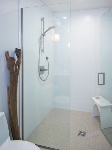 modern style white and wood Des Moines bathroom remodel by Silent Rivers