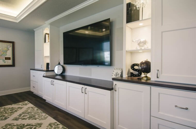 built-in entertainment center in Clive basement remodel by Silent Rivers